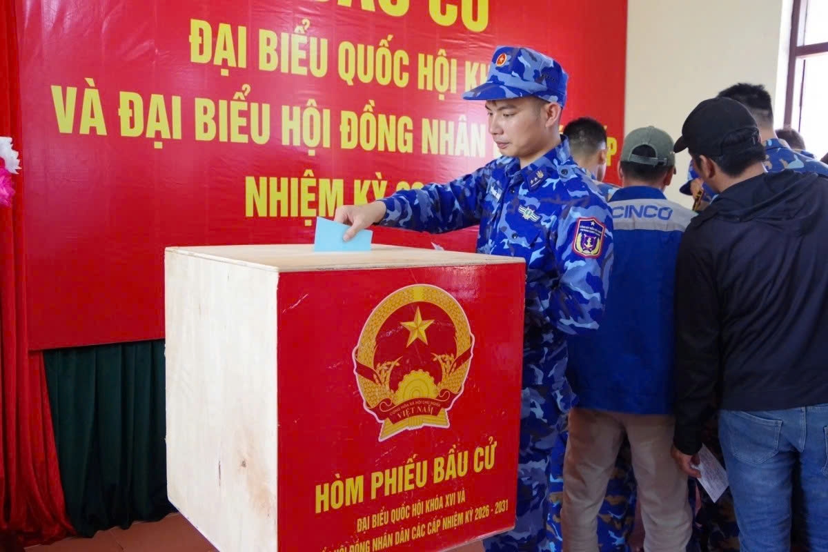 Coast Guard officers vote early while on duty at sea near Truong Sa